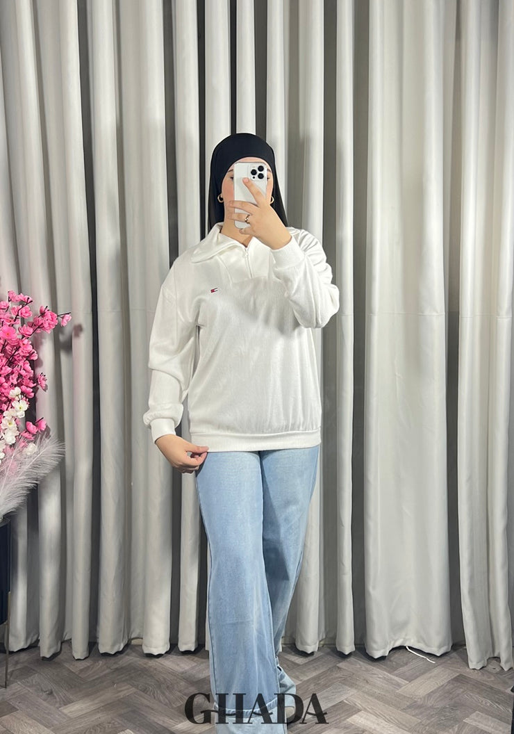 Pull en maile douce zippé à col en V