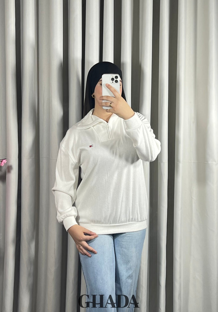 Pull en maile douce zippé à col en V