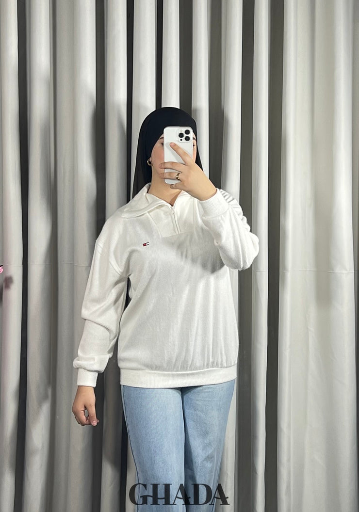 Pull en maile douce zippé à col en V