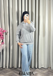 Pull en maile douce zippé à col en V