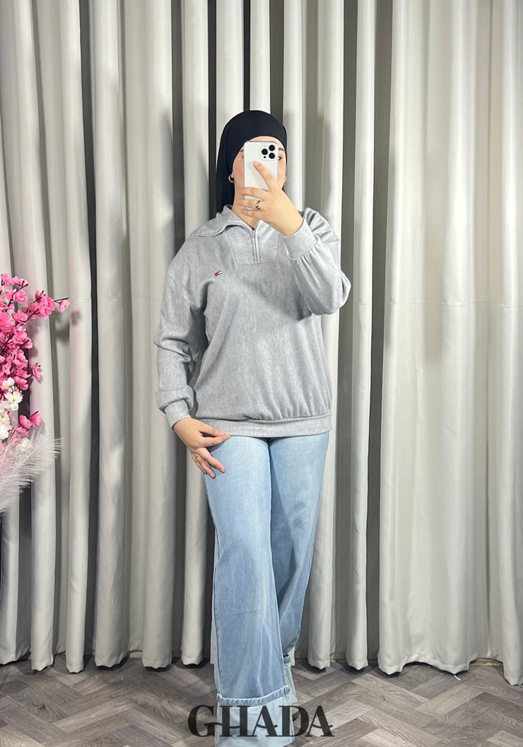 Pull en maile douce zippé à col en V