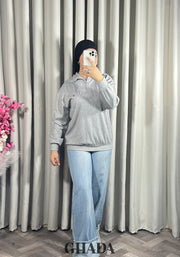 Pull en maile douce zippé à col en V