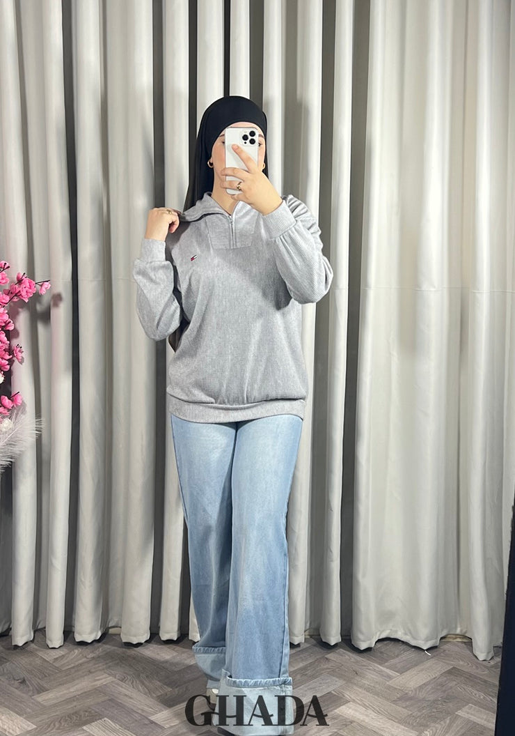 Pull en maile douce zippé à col en V