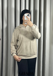 Pull en maile douce zippé à col en V