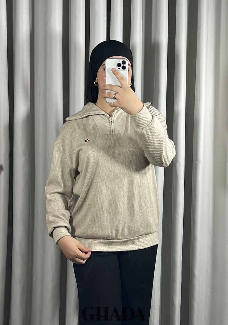 Pull en maile douce zippé à col en V