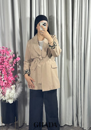Veste beige à motif léopard