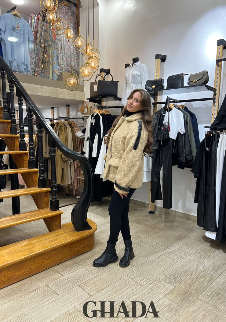 Manteau beige en duveteux