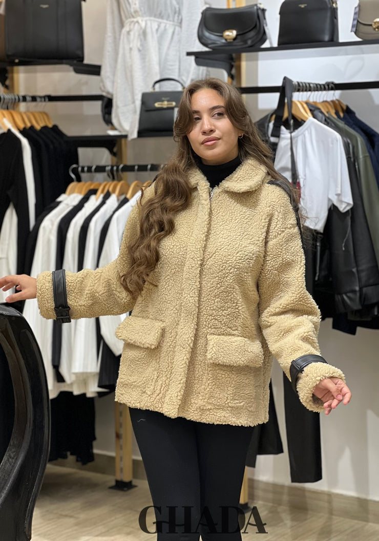 Manteau beige en duveteux