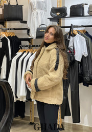 Manteau beige en duveteux