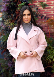 Manteau ample en rose bebe