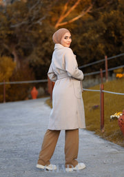 Manteau over size beige clair avec ceinture